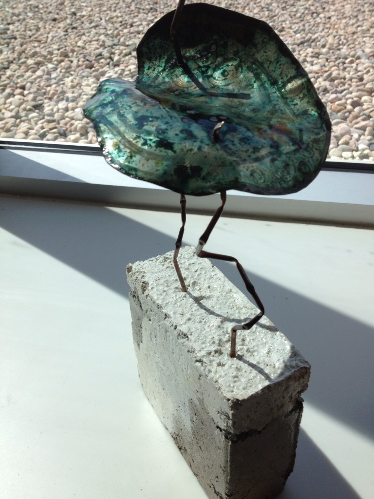 Concrete, silver, copper and enamel